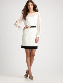 Impeccably designed, this dress features a feminine neckline, sheer details and contrasting trim.BoatneckSheer, cold-shoulder sleevesContrast trimBack zipperAbout 22 from natural waistSilk; skirt: 76% triacetate/21% polyester/3% polyurethaneDry cleanImported Model shown is 5'10 (177cm) wearing US size 4. Impeccably designed, this dress features a feminine neckline, sheer details and contrasting trim.BoatneckSheer, cold-shoulder sleevesContrast trimBack zipperAbout 22 from natural waistSilk; skirt: 76% triacetate/21% polyester/3% polyurethaneDry cleanImported Model shown is 5'10 (177cm) wearing US size 4.