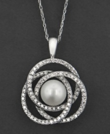 A soothing pattern of interlocking sparkling circles makes an eye-catching backdrop for a beautiful cultured freshwater pearl (7 mm). This pendant features round-cut diamonds (1/2 ct. t.w.) set in 14k white gold. Approximate length: 18 inches. Approximate drop: 1-1/4 inches. A soothing pattern of interlocking sparkling circles makes an eye-catching backdrop for a beautiful cultured freshwater pearl (7 mm). This pendant features round-cut diamonds (1/2 ct. t.w.) set in 14k white gold. Approximate length: 18 inches. Approximate drop: 1-1/4 inches.