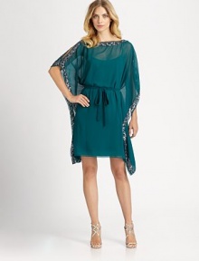 This chiffon caftan silhouette is defined by alluring shoulder slits and dazzling sequined trim.BoatneckSplit shouldersCaftan sleevesTie beltSequined trimFully linedAbout 19 from natural waistPolyesterSpot cleanImportedModel shown is 5'10 (177cm) wearing US size 4. 