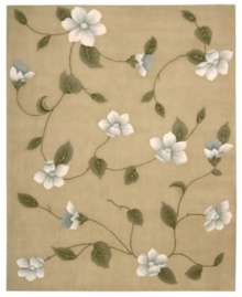 Floral appeal. Gracefully designed with delicate blossoms against a light gold ground, this area rug is hand tufted and hand carved from only the finest premium wool, then expertly washed to lend the surface a handsome luster, texture and sheen. Floral appeal. Gracefully designed with delicate blossoms against a light gold ground, this area rug is hand tufted and hand carved from only the finest premium wool, then expertly washed to lend the surface a handsome luster, texture and sheen.