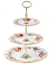 Royal Albert offers a festive twist on a favorite pattern, mixing Christmas trees, holly and bows with pink and gold blooms on the Old Country Roses Holiday tiered cake plate. Gold-banded porcelain coordinates flawlessly with the original dinnerware collection. Royal Albert offers a festive twist on a favorite pattern, mixing Christmas trees, holly and bows with pink and gold blooms on the Old Country Roses Holiday tiered cake plate. Gold-banded porcelain coordinates flawlessly with the original dinnerware collection.