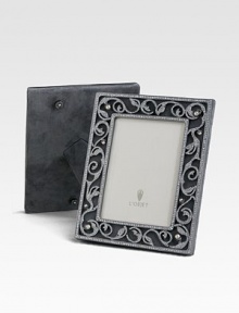 A stunning gift or keepsake made only for the most treasured photographs, crusted with faceted Swarovski crystals and freshwater pearls. Arrives in a gift box Accommodates a 5 X 7 photograph Overall: 7¼ X 9¼ Imported A stunning gift or keepsake made only for the most treasured photographs, crusted with faceted Swarovski crystals and freshwater pearls. Arrives in a gift box Accommodates a 5 X 7 photograph Overall: 7¼ X 9¼ Imported