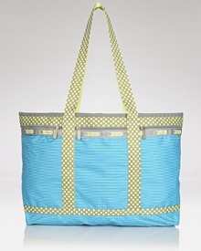 LeSportsac's latest tote features a cool color blocked effect, sure to add a on-trend pop whether you're embarking on a foreign adventure or darting around town. LeSportsac's latest tote features a cool color blocked effect, sure to add a on-trend pop whether you're embarking on a foreign adventure or darting around town.