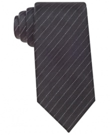 Stay in the spotlight with this striped silk tie from Geoffrey Beene. Stay in the spotlight with this striped silk tie from Geoffrey Beene.