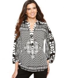 Push boundaries with this free-flowing geometric printed blouse from Alfani. Coordinate with slim pants and heels for an effortless everyday look. Push boundaries with this free-flowing geometric printed blouse from Alfani. Coordinate with slim pants and heels for an effortless everyday look.