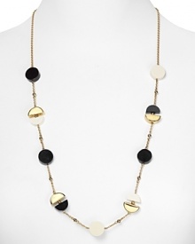 With a swingy shape and Deco stations, kate spade new york's disc necklace takes its cues from the '60's. Go retro-this bauble dresses up a turtleneck and platform heels. With a swingy shape and Deco stations, kate spade new york's disc necklace takes its cues from the '60's. Go retro-this bauble dresses up a turtleneck and platform heels.