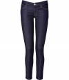 Sexy cropped skinny jeans in classic dark denim with orange contrast stitching - Traditional five-pocket design with button closure and zip fly - Long, fitted leg falls at ankle - Perfect choice for day or evening - Dress up with heels and a lace top, or dress down with ankle boots and an off-shoulder sweater