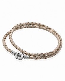 Charms and clips shine against PANDORA's leather double wrap bracelet. A sterling silver signature clasp lends an added touch of luxe.