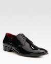 Handsomely crafted in sleek patent leather, this polished design is a formal wear essential.Patent leather upperLeather liningPadded insoleLeather sole Made in Italy