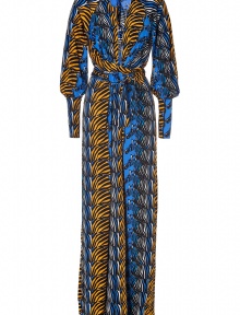 Dramatic and chic, this eye-catching zebra print maxi dress from Issa guarantees head-turning results - Wrap V-neckline, long sleeves, fitted cuffs, allover print - Form-fitting, floor-length - Try with bright heels and a sleek leather clutch