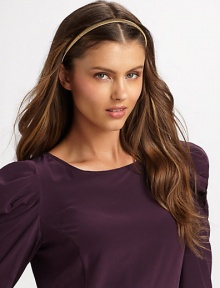 A neat, lightweight design with an elastic back. Metal About ½ wide Made in USA of imported materials A neat, lightweight design with an elastic back. Metal About ½ wide Made in USA of imported materials