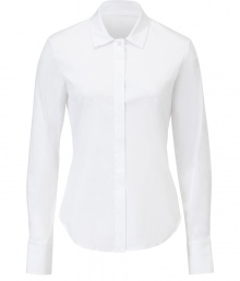 Theory updates the classic button-up blouse with this flattering, slim-fitting iteration - Spread collar, concealed button front placket, long sleeves, curved hem, slim fit - Pair with cropped trousers, a cashmere cardigan, and classic pumps