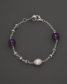 A bold sterling silver chain bracelet, gleaming with amethyst and freshwater pearl. By Di MODOLO. A bold sterling silver chain bracelet, gleaming with amethyst and freshwater pearl. By Di MODOLO.
