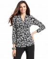 This printed top from Alfani is perfect with a pair of chic black pants for Monday through Friday.