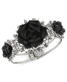 Black and beautiful. This bangle bracelet from 2028, crafted from silver-tone mixed metal, features glass stones and jet-colored flower details for a stunning effect. Approximate diameter: 6-1/2 inches. Black and beautiful. This bangle bracelet from 2028, crafted from silver-tone mixed metal, features glass stones and jet-colored flower details for a stunning effect. Approximate diameter: 6-1/2 inches.