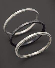 This set of stackable sterling silver rings are elegant alone or stacked. By Gurhan.