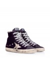 Luxe with a retro edge, these high-top sneakers from Golden Goose will kick your style into high gear - Round toe, lace up style, side star detail, exposed side-zip closure, stylishly distressed, contrasting rubber sole, back metallic leather stripe - Ankle height - Pair with oversized knits and skinnies, or casual tees and mini-skirts