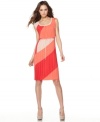 Bright colorblocking adds a graphic edge to this otherwise softly pleated BCBGMAXAZRIA dress -- perfect for a day-to-night look!