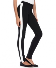 Go bold with INC's figure-hugging skinny pants, updated with chic contrasting tuxedo stripes! (Clearance)