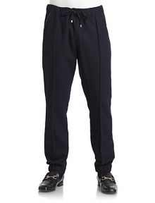 THE LOOKElastic waistband with drawstring closureSide slash pockets with leather pipingGathered elastic cuffsBack flap pocketTHE FITRise, about 12Inseam, about 30THE MATERIAL63% wool/37% cottonCARE & ORIGINDry cleanMade in Italy THE LOOKElastic waistband with drawstring closureSide slash pockets with leather pipingGathered elastic cuffsBack flap pocketTHE FITRise, about 12Inseam, about 30THE MATERIAL63% wool/37% cottonCARE & ORIGINDry cleanMade in Italy