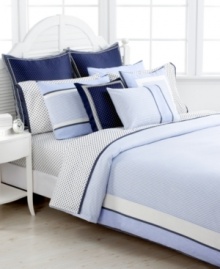 Preppy polish. A simple blue and white stripe pattern and coordinating polka dot elements make a classic statement in this Hilfiger Stripe duvet cover set from Tommy Hilfiger. Finished with blue, navy and white frame borders. Reverses to stripes. Button closure.