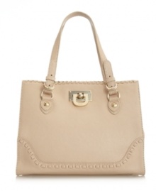 An oversized shopper is the perfect way to tote all your necessities without sacrificing style. This gorgeous design by DKNY features stunning whip stitching, shiny goldtone hardware and a signature front closure. An oversized shopper is the perfect way to tote all your necessities without sacrificing style. This gorgeous design by DKNY features stunning whip stitching, shiny goldtone hardware and a signature front closure.