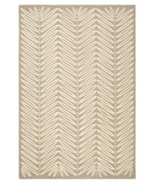 A herringbone pattern of leaves creates a fresh look for the modern home in this unique area rug from Martha Stewart rugs. Hand tufted in India of long wool fibers, this luxurious home accent presents unparalleled comfort and style underfoot. A herringbone pattern of leaves creates a fresh look for the modern home in this unique area rug from Martha Stewart rugs. Hand tufted in India of long wool fibers, this luxurious home accent presents unparalleled comfort and style underfoot.