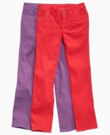 Bold bright colors enliven her fun fashion sense with these skinny stretch jeans from DKNY. (Clearance) Bold bright colors enliven her fun fashion sense with these skinny stretch jeans from DKNY. (Clearance)