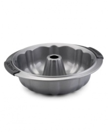 Beautify your bundts with the Anolon 9.5 fluted mold pan! New proprietary coating ensures superior release and makes cleanup a snap. Silicon-enhanced handles are steady and slip-free, while the pan's substantial weight provides durability and helps prevent warping. Beautify your bundts with the Anolon 9.5 fluted mold pan! New proprietary coating ensures superior release and makes cleanup a snap. Silicon-enhanced handles are steady and slip-free, while the pan's substantial weight provides durability and helps prevent warping.