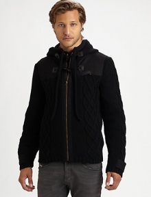 Classic cable knit lends a refined look to this zip-up, complete with stylish toggle closures. HoodFront zip and toggle closure Long ribbed cuff sleeves with button tabs Tonal shoulder panelsRibbed hem About 28 from shoulder to hem 50% wool/50% acrylicDry clean Imported Classic cable knit lends a refined look to this zip-up, complete with stylish toggle closures. HoodFront zip and toggle closure Long ribbed cuff sleeves with button tabs Tonal shoulder panelsRibbed hem About 28 from shoulder to hem 50% wool/50% acrylicDry clean Imported