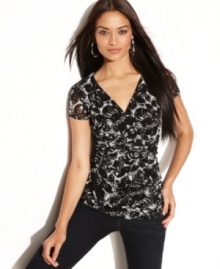 This petite top by INC features a sketch-like floral print and a fitted silhouette that makes for an alluring evening-out ensemble with skinny dark denim (and your highest heels, of course!). This petite top by INC features a sketch-like floral print and a fitted silhouette that makes for an alluring evening-out ensemble with skinny dark denim (and your highest heels, of course!).