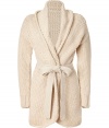 Luxurious knit cardigan in a fine, beige wool - Designed in a new, long silhouette for a narrow, yet relaxed look - Features an elegant shawl collar and flattering waist belt - Extra-long sleeves - A cool, cozy piece for everyday - Pair with favorite jeans and thin turtlenecks, or with leather pants and a wool-silk tank