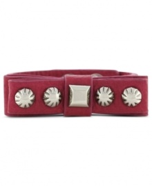 Wrap up your fun new look with Jessica Simpson's PVC snap bracelet. Features a bow with silver tone stud detail. Crafted in pink PVC. Approximate length: 8 inches.