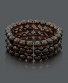 Pair this season's must-have trend: the maxi dress, with a chic, neutral cuff. Perfect breezy bohemian style with three rows of 8-9 mm smokey quartz beads (225 ct. t.w.) in a slip-on stretch setting with sterling silver accents. Approximate length: 7-1/2 inches. Pair this season's must-have trend: the maxi dress, with a chic, neutral cuff. Perfect breezy bohemian style with three rows of 8-9 mm smokey quartz beads (225 ct. t.w.) in a slip-on stretch setting with sterling silver accents. Approximate length: 7-1/2 inches.
