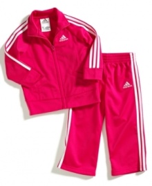 Actively start her sporty style with this athletic tricot jacket and pant set from adidas. Actively start her sporty style with this athletic tricot jacket and pant set from adidas.
