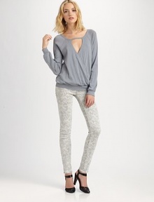 Airy pointelle knit in a crossover blouson silhouette.Cut-out V necklineRaglan sleevesCrossover bodiceBanded waistBack cut-outsAbout 25 from shoulder to hemCottonHand washImportedModel shown is 5'9½ (176cm) wearing US size Small. Airy pointelle knit in a crossover blouson silhouette.Cut-out V necklineRaglan sleevesCrossover bodiceBanded waistBack cut-outsAbout 25 from shoulder to hemCottonHand washImportedModel shown is 5'9½ (176cm) wearing US size Small.
