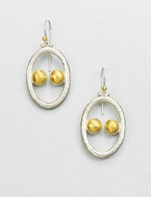 An abstract drop style with hammered sterling silver accented with radiant 24k gold. Sterling silver24k goldDrop, about 1Hook backImported An abstract drop style with hammered sterling silver accented with radiant 24k gold. Sterling silver24k goldDrop, about 1Hook backImported