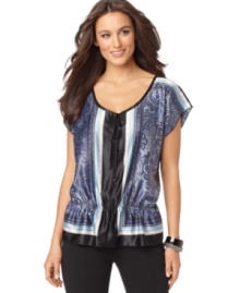 A heritage-inspired scarf print and satiny fabric makes AGB's peplum blouse a sophisticated option for day or night!