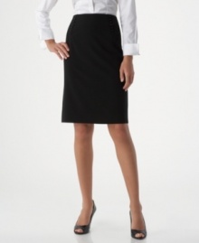 AGB's stylish pencil skirt impresses both coming and going, with button accents along the front yoke and a pretty back flounce. AGB's stylish pencil skirt impresses both coming and going, with button accents along the front yoke and a pretty back flounce.
