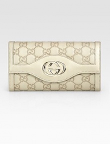 Rich, logo-stamped metallic leather in foldover silhouette topped with GG hardware.Magnetic snap flap pocketCenter zip pocketTwo inner compartmentsTwelve credit card slotsFully lined7½W X 4H X 1¼DMade in Italy Rich, logo-stamped metallic leather in foldover silhouette topped with GG hardware.Magnetic snap flap pocketCenter zip pocketTwo inner compartmentsTwelve credit card slotsFully lined7½W X 4H X 1¼DMade in Italy