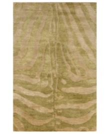 Not your everyday animal print, this distinctive rug interprets a classic motif into a chic, contemporary design. The Serengeti rug is hand-tufted of plush wool, creating a durable piece with an incredibly soft hand. Not your everyday animal print, this distinctive rug interprets a classic motif into a chic, contemporary design. The Serengeti rug is hand-tufted of plush wool, creating a durable piece with an incredibly soft hand.