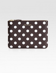 A secure zip pouch in a fun and whimsical polka dot printed leather.Top zip closureFully lined8¾W X 6¼H X ½DImported A secure zip pouch in a fun and whimsical polka dot printed leather.Top zip closureFully lined8¾W X 6¼H X ½DImported