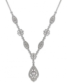 Look pretty in vintage-chic with Eliot Danori's Ella Y necklace. Intricate patterns shine with sparkling crystals and cubic zirconias (3/4 ct. t.w.). Crafted in rhodium-plated silver tone mixed metal. Approximate length: 16 inches + 2-inch extender. Approximate drop: 4-1/2 inches.