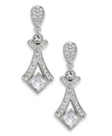 Glamour takes center stage with the Grandeur linear earrings from Eliot Danori. Crafted from rhodium-plated brass, the earrings illuminate with crystal and cubic zirconias (2-1/2 ct. t.w.). Approximate drop: 1-1/2 inches.