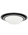 Bold black and white stripes create a crisp, graphic pattern that lends your tabletop a touch of modern sophistication.