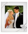 Preserve a cherished moment of your own or treat your favorite newlyweds to the True Love picture frame. Interlocking hearts adorn elegant silver plate, a beautiful showcase for wedding or honeymoon photos. Qualifies for Rebate