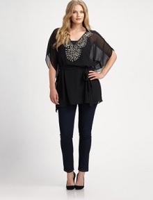 Exquisitely designed from fine Indian fabrication, an embellished kimono top. Its self-tie belt flawlessly defines the shape.V-necklineKimono sleevesSelf-tie beltPull-on styleAbout 32 from shoulder to hemPolyesterHand washImported