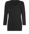 Stylish long sleeve shirt in black stretch cotton - very fine and comfortable quality - feminine cut with broad trimmed crew neck and long sleeves - waist fitted, nice and long, sexy figure hugging cut - your new favorite basic, the one you always need, the one youve always been looking for - wear solo or underneath - pair at leisure time with tube jeans, shorts, skirts, at the office with a pant suit