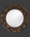 Open clamshells mingle with curling leaves in a mottled bronze ring with inner beading. Alluring on the bedroom, living room or foyer wall, this round mirror dresses up any space with timeless, lasting beauty.