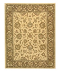 Earthy colored fibers are arranged in intricate patterns in the Heritage area rug from Safavieh, creating a look reminiscent of ancient royal textiles. Hand tufted and woven from pure wool by experienced artisans in India, it makes a refined statement wherever placed. (Clearance) Earthy colored fibers are arranged in intricate patterns in the Heritage area rug from Safavieh, creating a look reminiscent of ancient royal textiles. Hand tufted and woven from pure wool by experienced artisans in India, it makes a refined statement wherever placed. (Clearance)